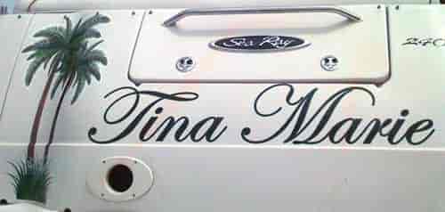Custom lettering and graphic on a boat