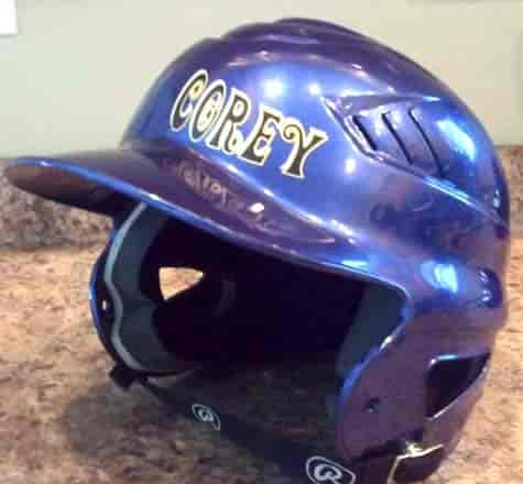 Custom vinyl lettering on a baseball helmet