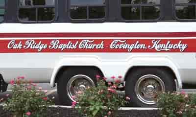 Vinyl lettering on a church bus