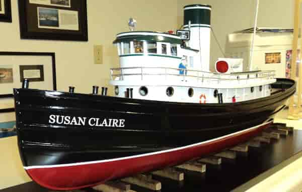 Custom lettering on a model ship
