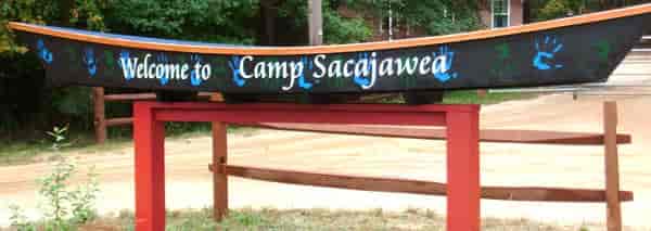 Custom vinyl lettering on a Camp canoe