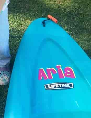 Colorful vinyl lettering for a kayak