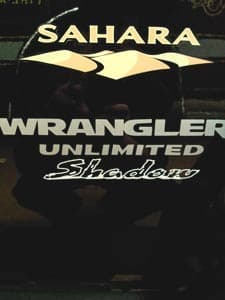 Vinyl lettering on a Jeep