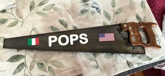 Custom lettering on a carpenter saw Custom lettering on a carpenter saw