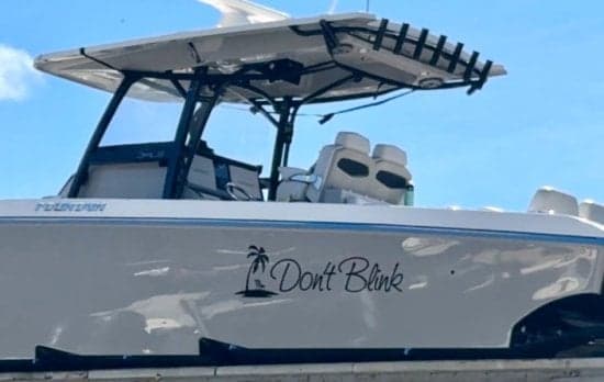 Custom vinyl lettering on a boat Custom vinyl lettering on a boat