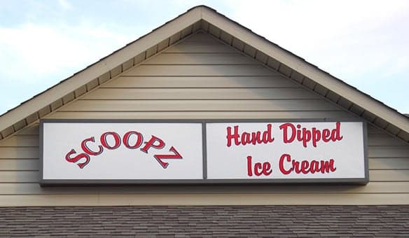 Custom lettering on a sign