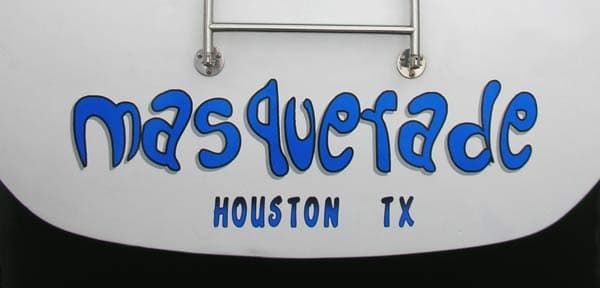 Custom vinyl lettering on a boat