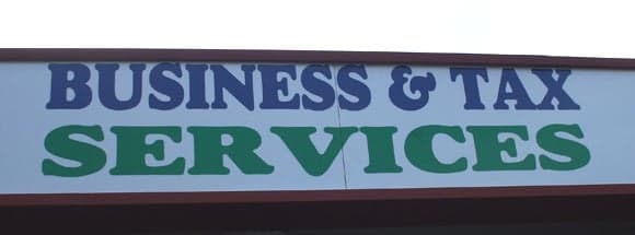 Lettering on a store front sign Lettering on a store front sign