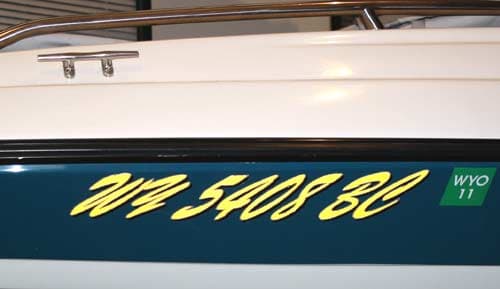 Custom vinyl lettering on a boat Custom vinyl lettering on a boat
