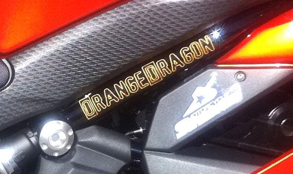 Custom vinyl lettering on a motorcycle Custom vinyl lettering on a motorcycle