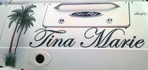 Custom lettering and graphic on a boat Custom lettering and graphic on a boat