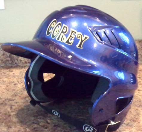 Custom vinyl lettering on a baseball helmet Custom vinyl lettering on a baseball helmet