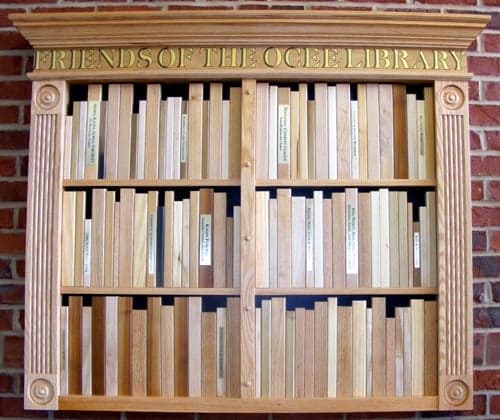 Custom lettering on a bookshelf Custom lettering on a bookshelf