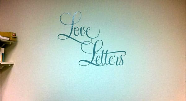 Custom vinyl lettering on a wall