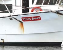 Custom vinyl lettering on a boat Custom vinyl lettering on a boat