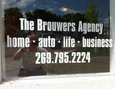 Custom vinyl lettering a window