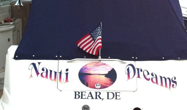 Custom graphics and lettering on a boat Custom graphics and lettering on a boat