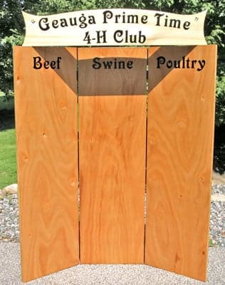 Vinyl lettering on a wooden sign Vinyl lettering on a wooden sign