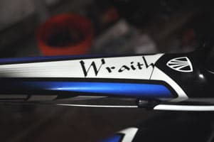 Custom lettering on a bicycle and helmet