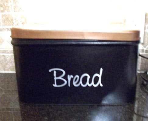 Custom lettering on a bread box