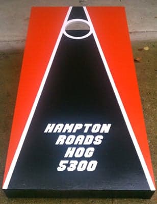 Vinyl lettering on a cornhole board. Vinyl lettering on a cornhole board.