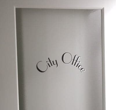 Custom vinyl lettering on an office door Custom vinyl lettering on an office door