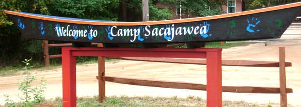 Custom vinyl lettering on a Camp canoe Custom vinyl lettering on a Camp canoe