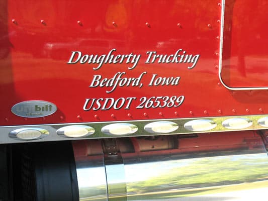 Vinyl lettering on a semi Vinyl lettering on a semi