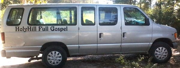 Custom vinyl lettering on a van Custom vinyl lettering on a van