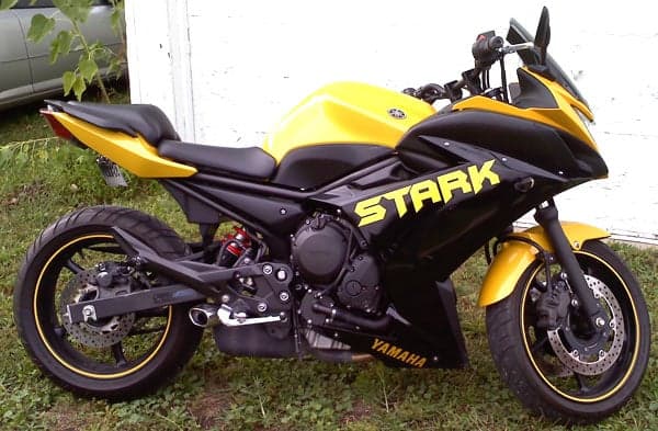 Custom vinyl lettering on a motorcycle Custom vinyl lettering on a motorcycle