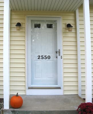 Custom vinyl numbers on a glass door