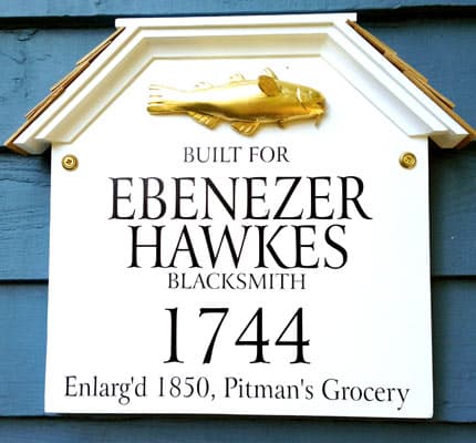 Custom lettering on an address plaque