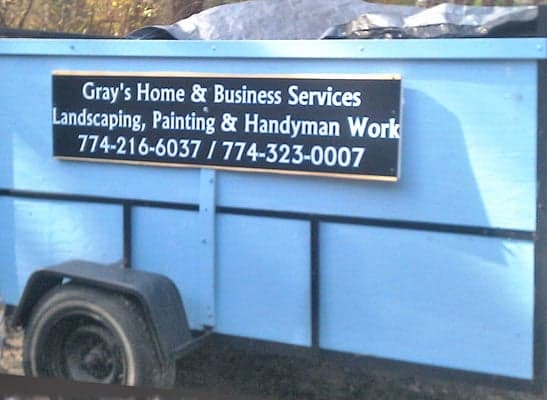 Custom vinyl lettering on a trailer