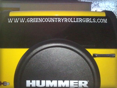 Vinyl lettering on a vehicle window Vinyl lettering on a vehicle window