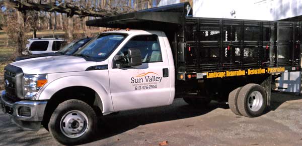 Custom vinyl lettering and graphics on a truck Custom vinyl lettering and graphics on a truck