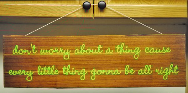 Lettering on a wooden sign Lettering on a wooden sign
