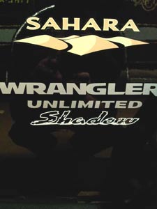 Vinyl lettering on a Jeep Vinyl lettering on a Jeep