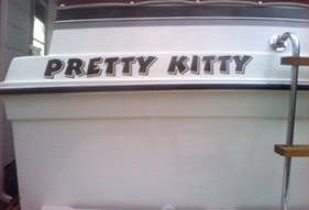 Custom lettering on a boat Custom lettering on a boat