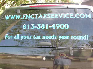 Vinyl lettering on a vehicle window Vinyl lettering on a vehicle window