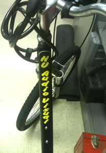 Custom vinyl lettering on a bicycle Custom vinyl lettering on a bicycle