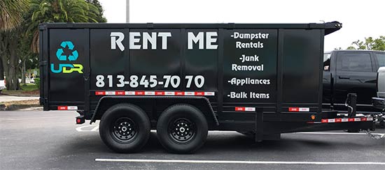 Vinyl lettering on a dump trailer Vinyl lettering on a dump trailer