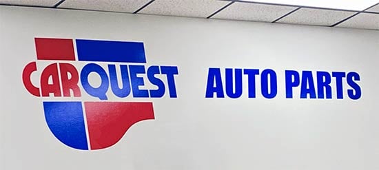 Red and blue lettering on a wall Red and blue lettering on a wall