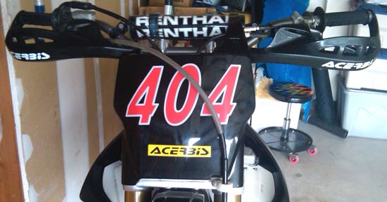 Lettering on an off highway motorcycle Lettering on an off highway motorcycle