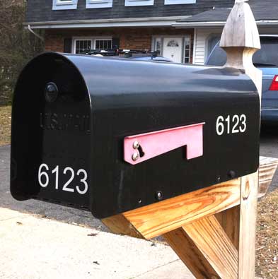 Vinyl numbers on a mailbox Vinyl numbers on a mailbox