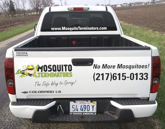 Vinyl lettering and graphic on a work truck Vinyl lettering and graphic on a work truck