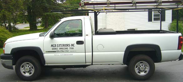 Custom lettering on a work truck Custom lettering on a work truck