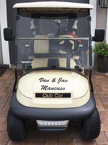 Vinyl lettering on a club car Vinyl lettering on a club car