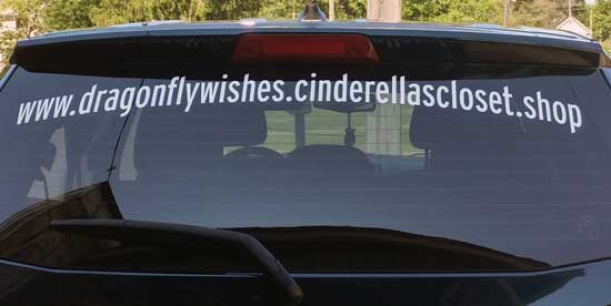Adhesive lettering on a vehicle window Adhesive lettering on a vehicle window
