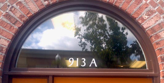 Vinyl letterning on an office window Vinyl letterning on an office window