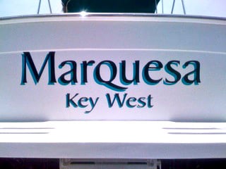 Custom lettering on a boat Custom lettering on a boat